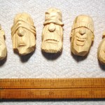 photo of 5 caricature faces with no eyes