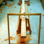 photo of frame saw, saw benches, and a long board