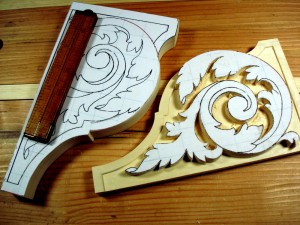 photo of both shelf brackets - acanthus scroll carvings