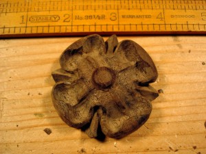 photo of a small rosette carving