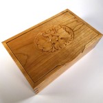 photo of oval rose box highlighting the carving