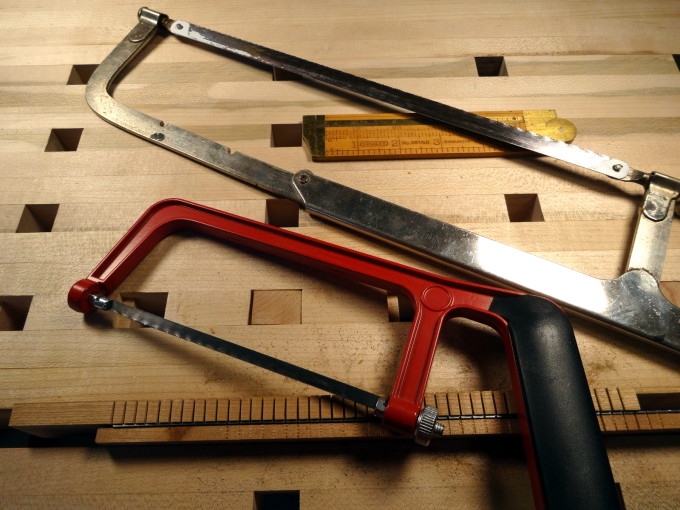 photo of cutting set up and two hack saws