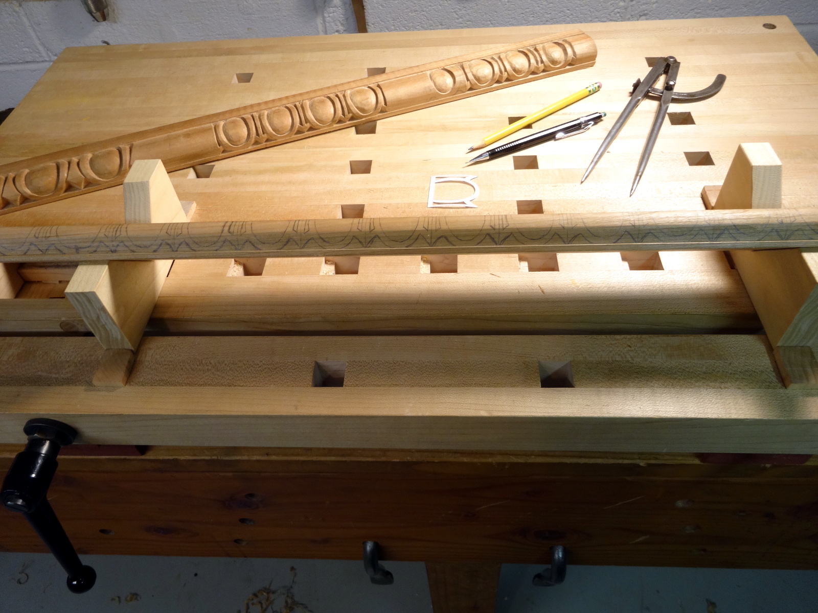 photo showing vee-blocks on the carving bench