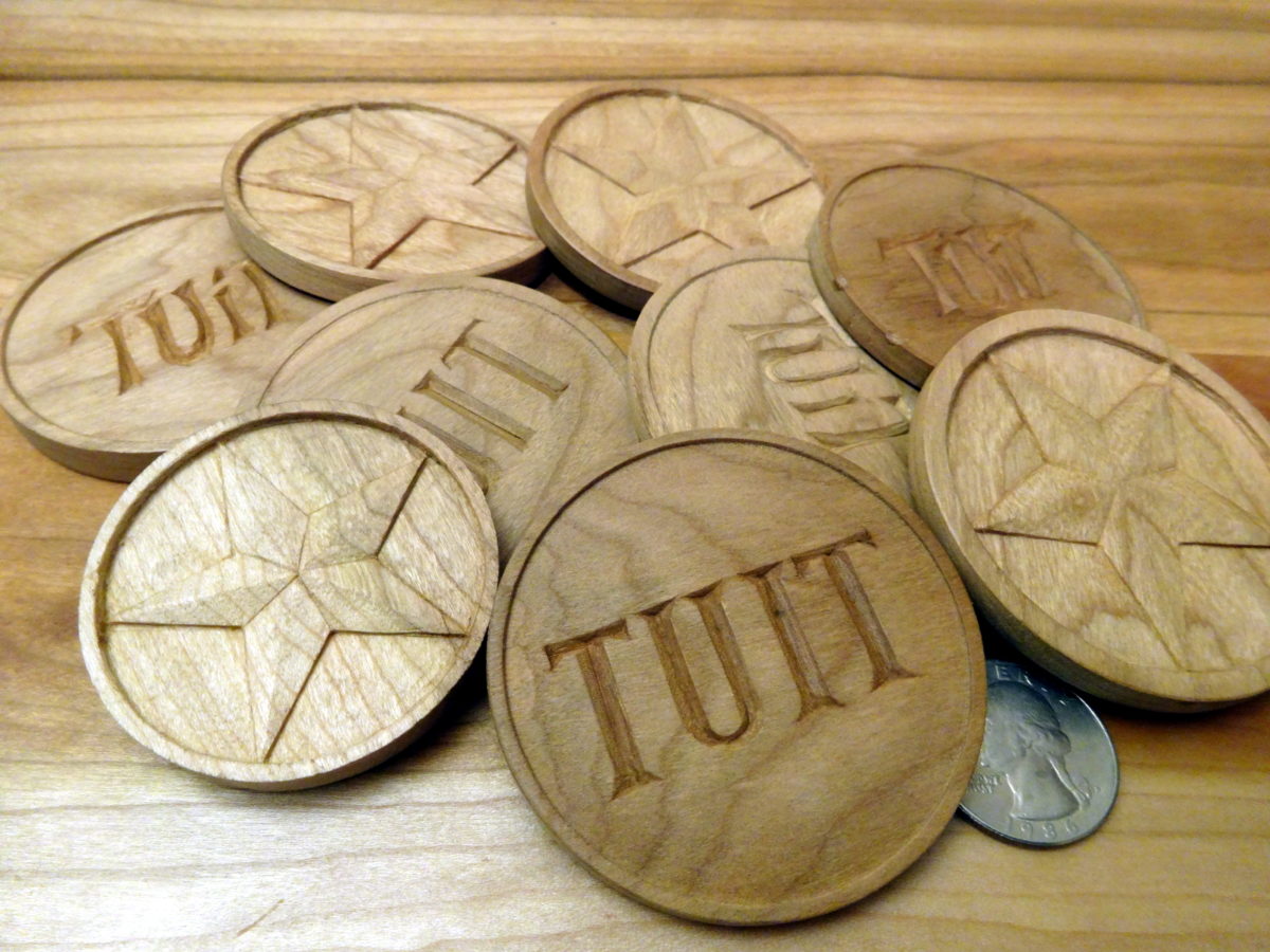 photo of hand carved round tuits