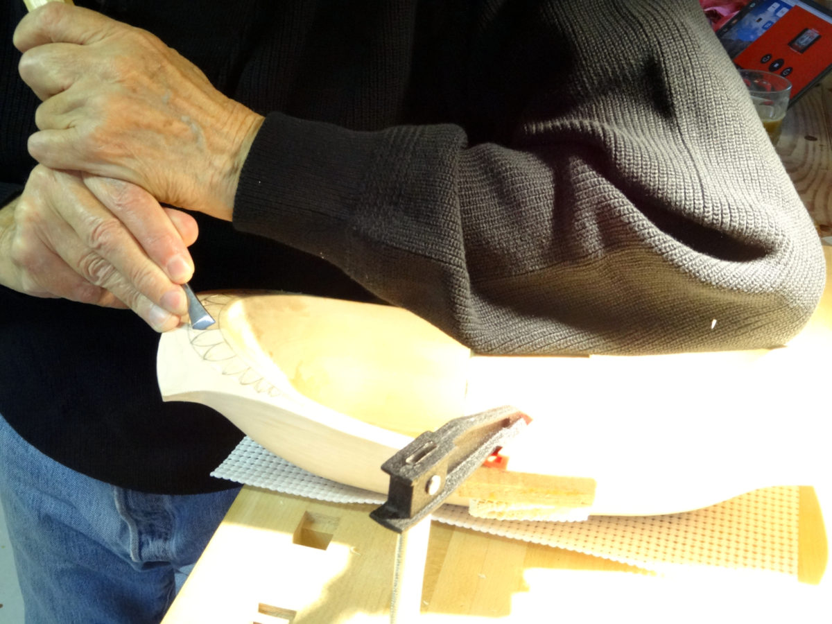 photo - carving the necklace