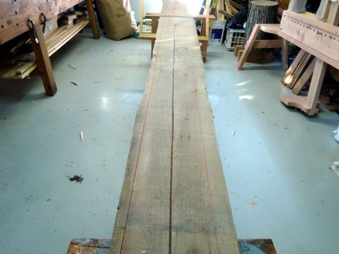 photo of long board and frame saw