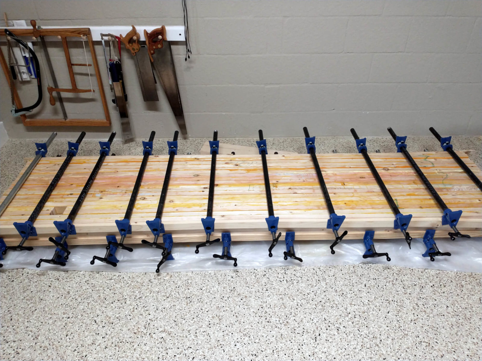 photo of full benchtop glued up and in clamps